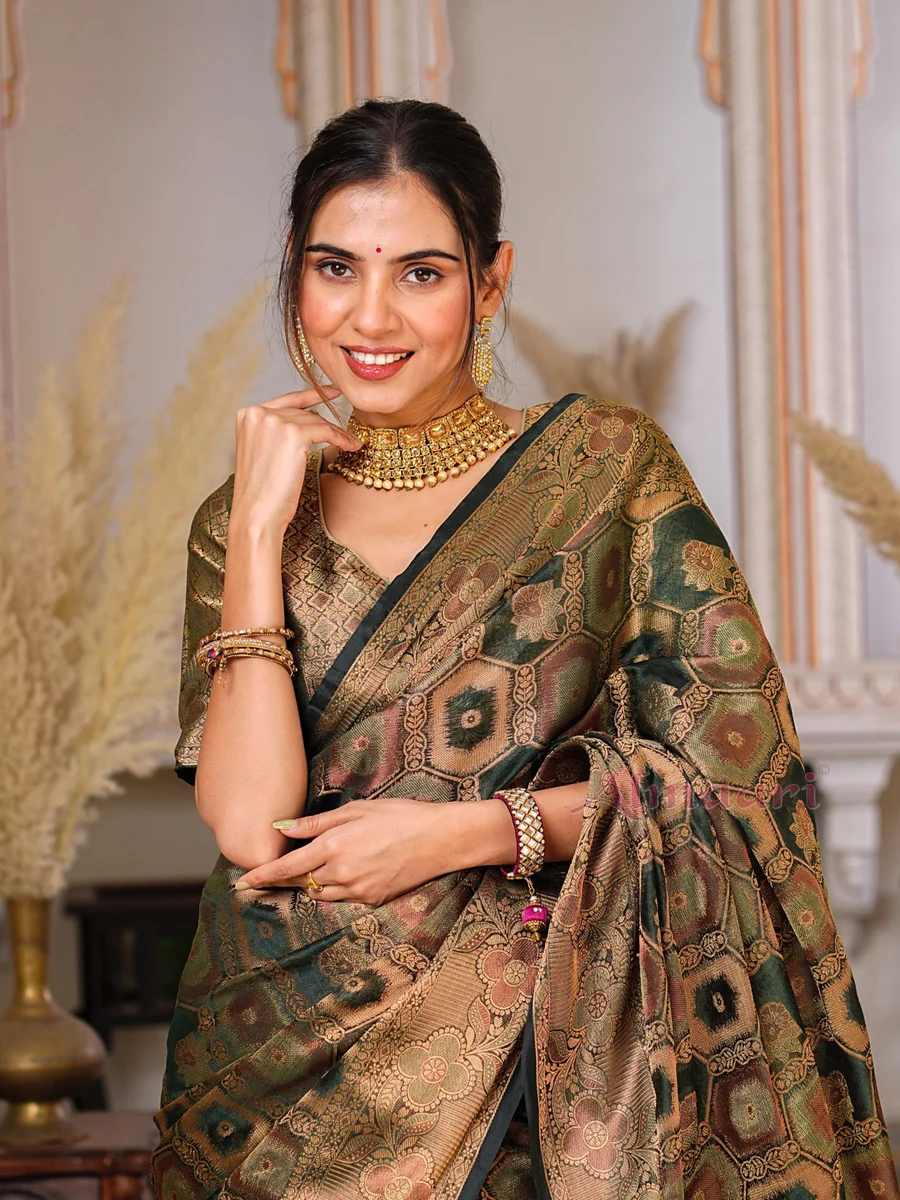 Dark Green Color Pure Organza Saree Adorned with Zari Weaving, Complete with Matching Blouse Piece
