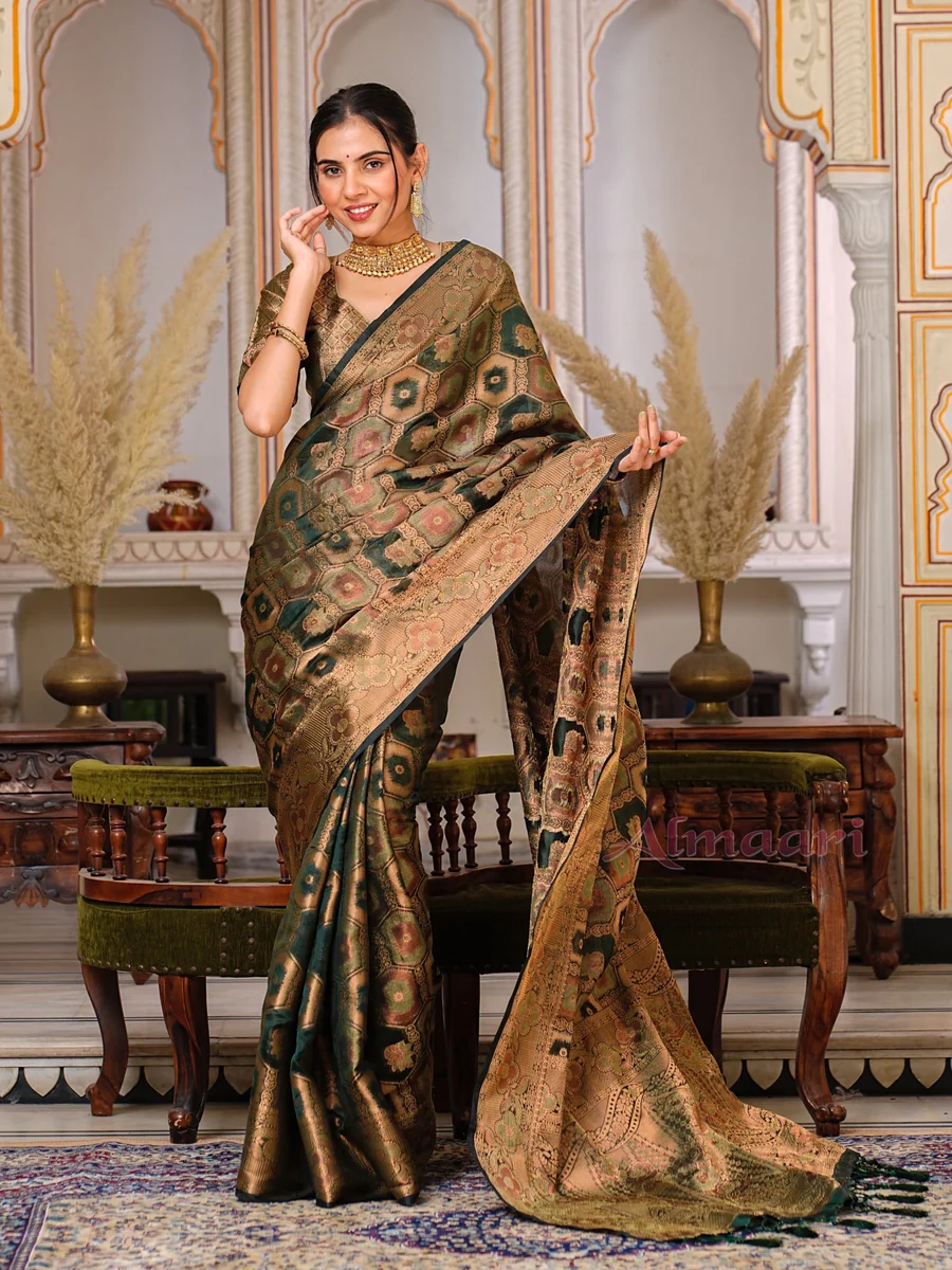 Dark Green Color Pure Organza Saree Adorned with Zari Weaving, Complete with Matching Blouse Piece